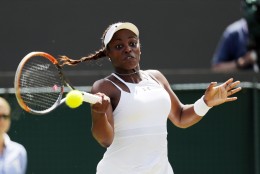 Sloane Stephens of the U.S returns to Svetlana Kuznetsova of Russia during their women's singles match on day seven of the Wimbledon Tennis Championships in London, Sunday, July 3, 2016. (AP Photo/Ben Curtis)