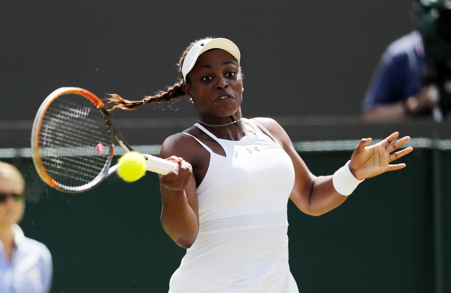 Sloane Stephens of the U.S returns to Svetlana Kuznetsova of Russia during their women's singles match on day seven of the Wimbledon Tennis Championships in London, Sunday, July 3, 2016. (AP Photo/Ben Curtis)