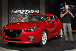 IMAGE DISTRIBUTED FOR MAZDA - Derek Jenkins, Director of Design for Mazda North America, introduces the new Mazda 3 at the Mazda Unveil &amp; Press Event on Wednesday, June 26, 2013 in New York. (John Minchillo/AP Images for Mazda)