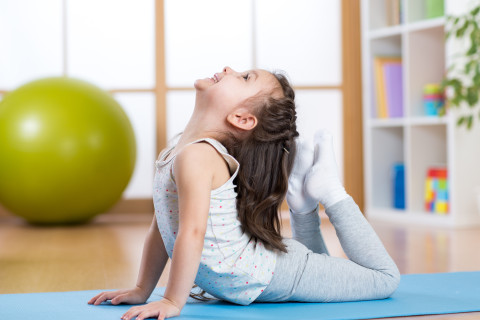 Introduce kids to yoga for a cool, calm summer activity