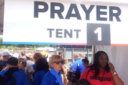 Staff work at a prayer tent during the Together 2016 event Saturday, July 16, 2016. (WTOP/Dick Uliano)