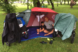 This family created a "base camp" to stay dry. They got to the National Mall at around 1 p.m. to prepare for the Fourth of July festivities. (WTOP/Michelle Basch)