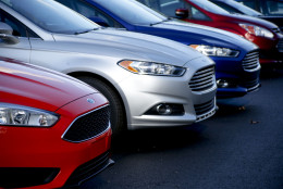 FILE - In this Thursday, Nov. 19, 2015, file photo, a row of new Ford Fusions are for sale on the lot at Butler County Ford in Butler, Pa. May is usually one of the strongest months of the year for the U.S. auto industry, as Americans buy cars ahead of summer road trips. But in May 2016, U.S. auto sales were expected to drop 6 percent to 1.53 million cars and trucks, according to car shopping site Kelley Blue Book. (AP Photo/Keith Srakocic, File)