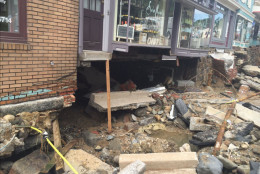 Flooding is seen in Ellicott City ravaged through Main Street Saturday, July 30, 2016. (WTOP/Dennis Foley)