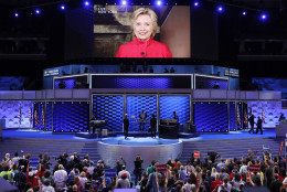 Democratic Presidential candidate Hillary Clinton appears on a large monitor to thank delegates during the second day of the Democratic National Convention in Philadelphia , Tuesday, July 26, 2016. (AP Photo/J. Scott Applewhite)
