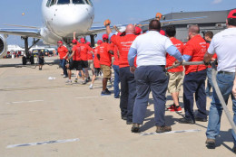A team competes at the 2014 plane hauling competition. (Courtesy Virginia Special Olympics)