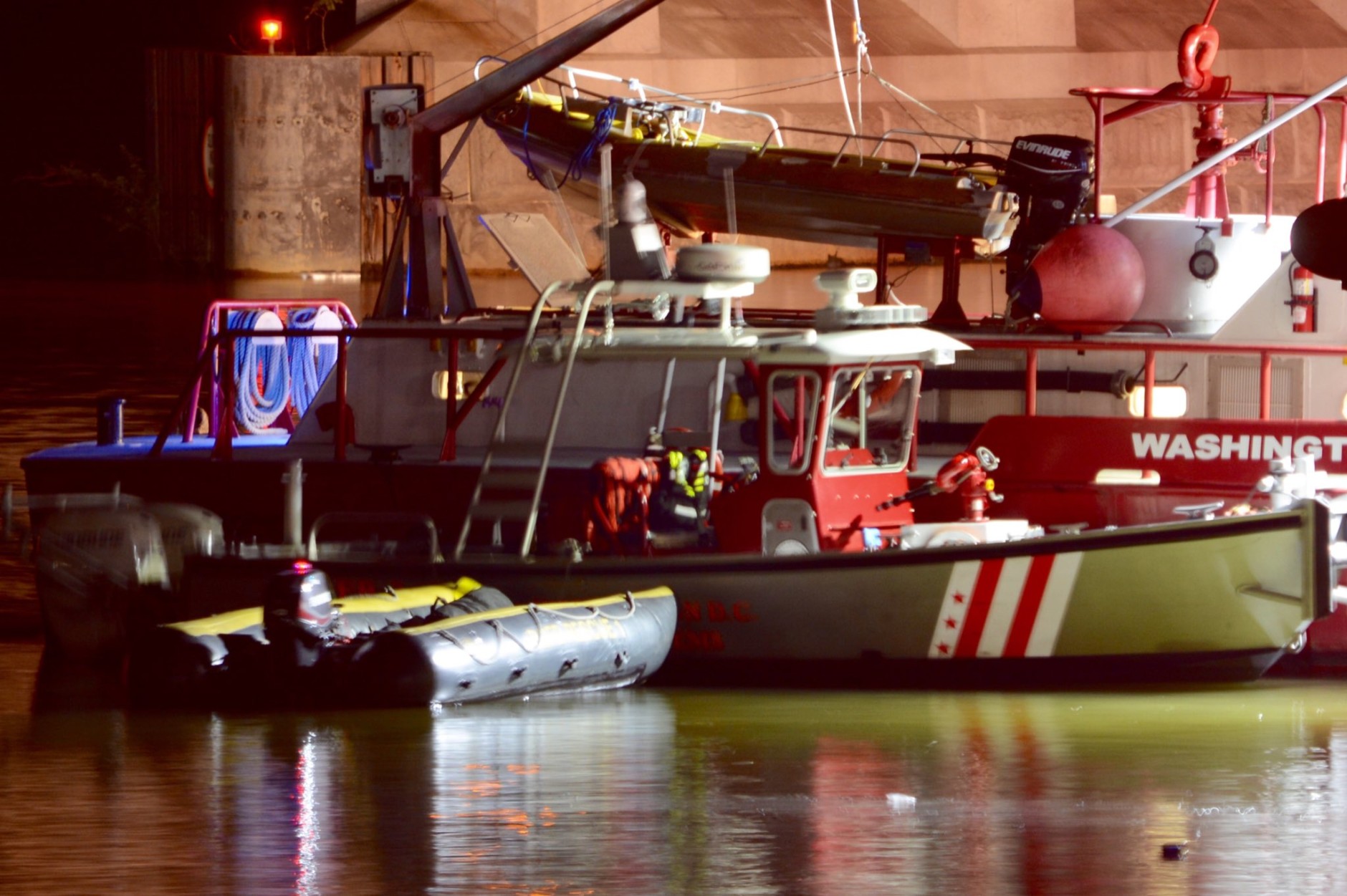 D.C. Fire and EMS have recovered the car that crashed into the Potomac River near Roosevelt Bridge late Saturday evening. (WTOP/Dave Dildine)