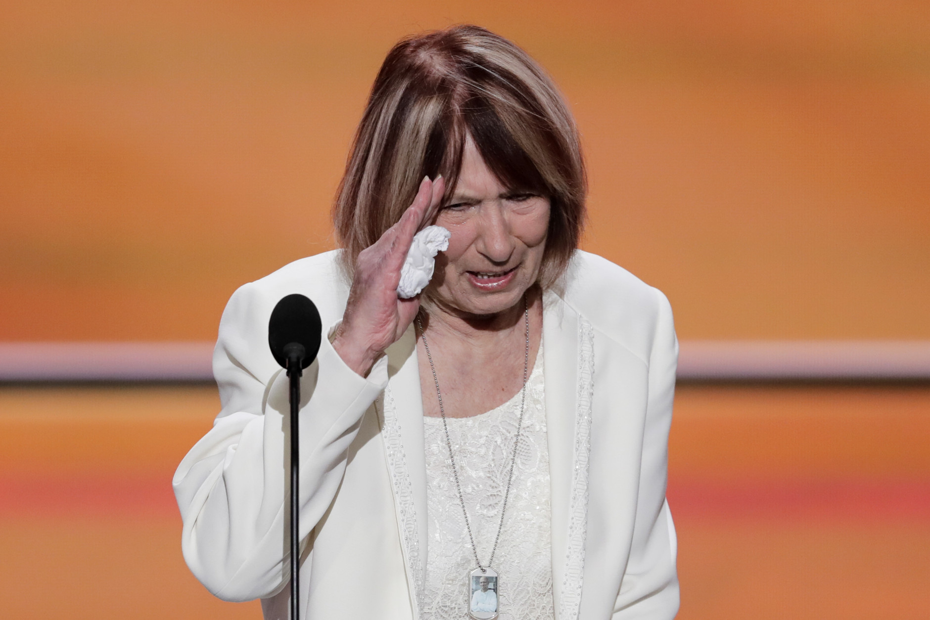 Pat Smith, mother of Benghazi victim Sean Smith, salutes after speaking during the opening day of the Republican National Convention in Cleveland, Monday, July 18, 2016. (AP Photo/J. Scott Applewhite)