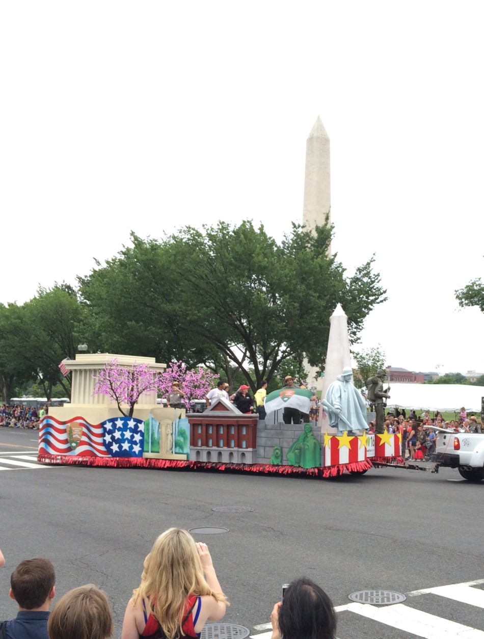 A parade float of iconic Washington monuments glide along Constitution Avenue on Monday, July 4, 2016. (Dick Uliano/WTOP)