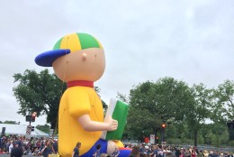 Children's favorite Caillou delights children along the parade route of the National Independence Day Parade, July 4, 2016. (Dick Uliano/WTOP)