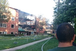 The aftermath of the explosion and fire at the Flower Branch apartment complex. (WTOP/Dennis Foley)