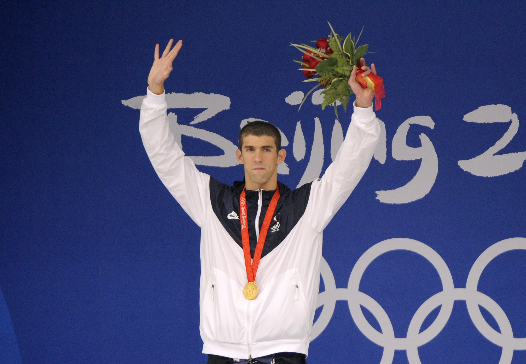 U.S. Swimmer Michael Phelps during gold medal ceremony for the men's 200-meter butterfly final during the swimming competitions in the National Aquatics Center at the Beijing 2008 Olympics in Beijing, Wednesday, Aug. 13, 2008. Phelps set a world record in the event. (AP Photo/Mark J. Terrill)