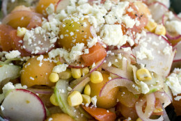 This June 6, 2011 photo shows tomato, corn and melon summer salad in Concord, N.H.  For APs 20 Salads of Summer series, chef Nate Appleman offered this robustly flavored salad of tomatoes, raw corn and cantaloupe dressed with a jalapeno vinaigrette.    (AP Photo/Matthew Mead)