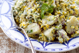 This Monday, July 11, 2011 photo shows potato salad studded with grilled corn and poblano peppers in Concord, N.H.  For Marcela Valladolid, salads are not starters. They are big and substantial.  For the AP's 20 Salads of Summer series, Valladolid offered this potato salad recipe.    (AP Photo/Matthew Mead)