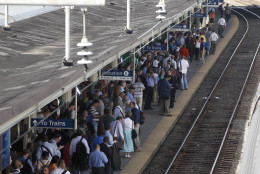 Passengers crowd the platform of a commuter train as they wait for it to arrive at Union Station in Washington, Tuesday, Aug. 23, 2011, after an earthquake in the Washington area. A 5.9 magnitude earthquake centered in Virginia forced evacuations of all the monuments on the National Mall in Washington and rattled nerves from Georgia to Martha's Vineyard, the Massachusetts island where President Barack Obama is vacationing. No injuries were immediately reported.  (AP Photo/Charles Dharapak)