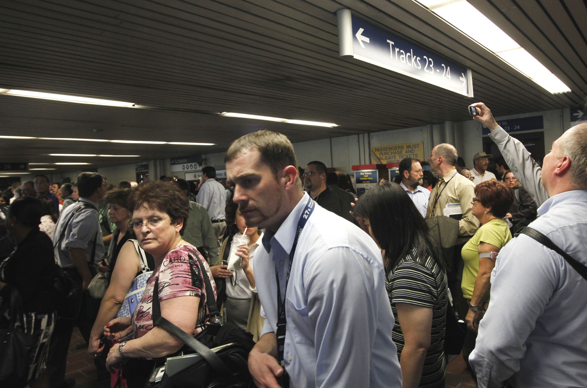 Passengers crowd the platform of a commuter train as they wait for it to arrive at Union Station in Washington, Tuesday, Aug. 23,2011, after an earthquake in the Washington area. A 5.9 magnitude earthquake centered in Virginia forced evacuations of all the monuments on the National Mall in Washington and rattled nerves from Georgia to Martha's Vineyard, the Massachusetts island where President Barack Obama is vacationing. No injuries were immediately reported.  (AP Photo/Charles Dharapak)