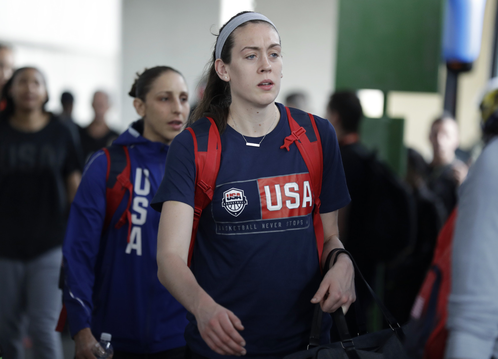 United States women's basketball player Breanna Stewart boards a bus at the airport after arriving at the 2016 Summer Olympics in Rio de Janeiro, Brazil, Wednesday, Aug. 3, 2016. (AP Photo/Charlie Neibergall)