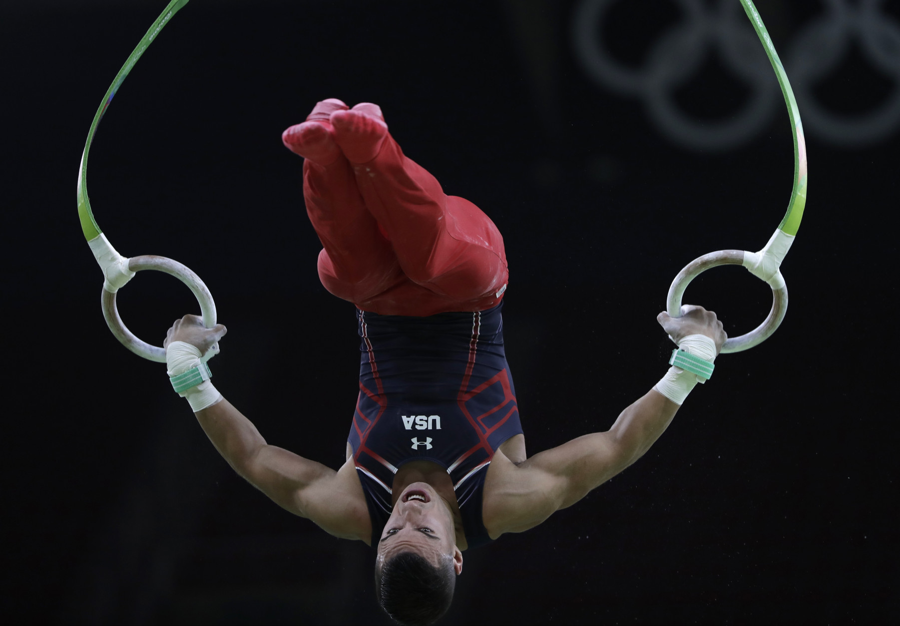 Gymnast from the United States Jacob Dalton trains on the rings ahead of the 2016 Summer Olympics in Rio de Janeiro, Brazil, Wednesday, Aug. 3, 2016. (AP Photo/Dmitri Lovetsky)