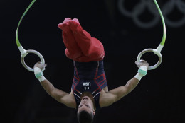Gymnast from the United States Jacob Dalton trains on the rings ahead of the 2016 Summer Olympics in Rio de Janeiro, Brazil, Wednesday, Aug. 3, 2016. (AP Photo/Dmitri Lovetsky)