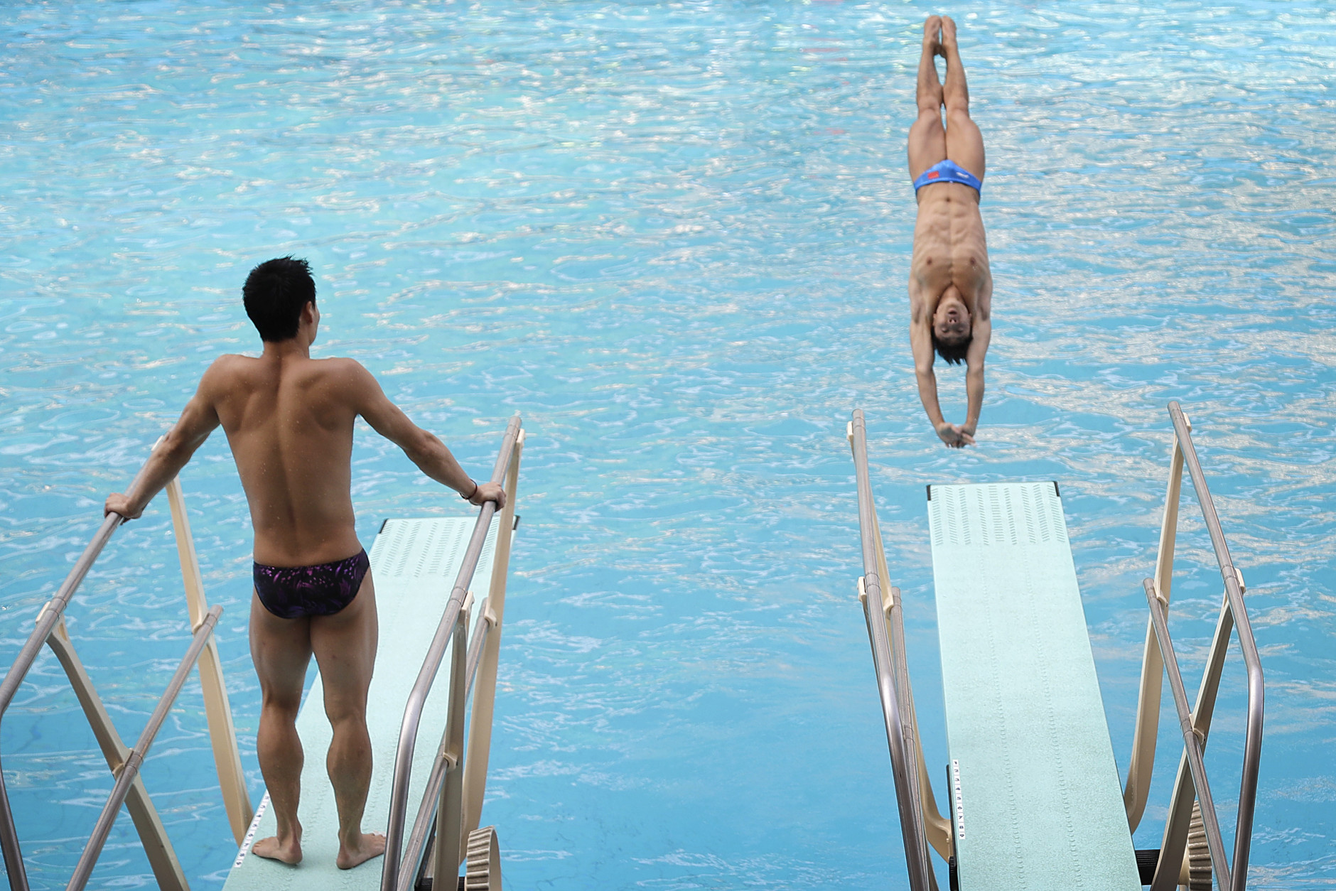 Members of China's diving team take part in a training session at the Maria Lenk Aquatic Center ahead of the 2016 Summer Olympics in Rio de Janeiro, Brazil, Wednesday, Aug. 3, 2016. (AP Photo/Wong Maye-E)