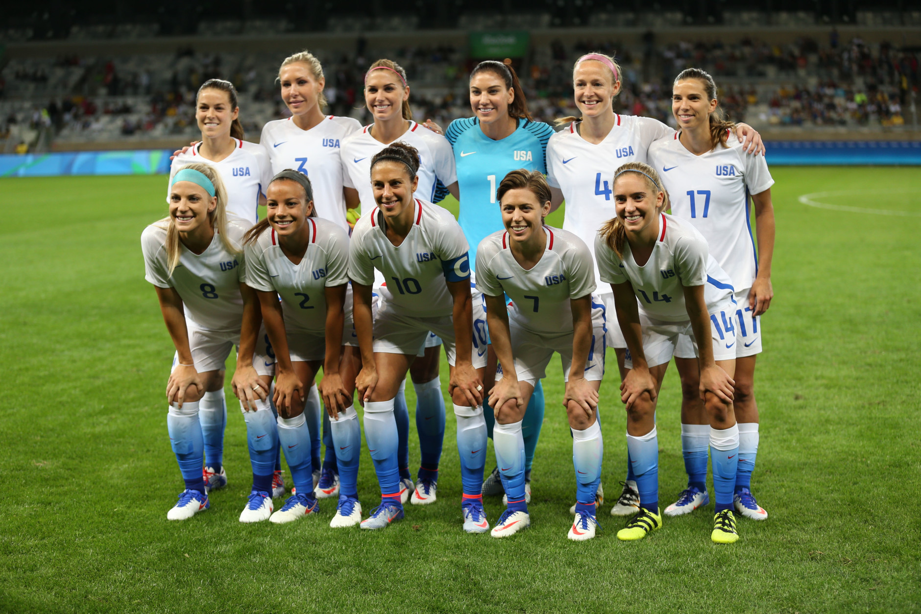 The United States Women's Olympic Football team poses for photos prior to a match against New Zealand during a Women's Olympic Football Tournament match at the Mineirao stadium in Belo Horizonte, Brazil, Wednesday, Aug. 3, 2016. (AP Photo/Eugenio Savio)