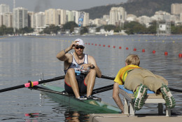 Gret Britain's Alan Campbell launches a bottle of water before competing in the rowing Men's single sculls in Lagoa during the 2016 Summer Olympics in Rio de Janeiro, Brazil, Saturday, Aug. 6, 2016. (Luca Bruno)