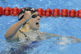 United States' Katie Ledecky celebrates after setting a new world record in the women's 400-meter freestyle final during the swimming competitions at the 2016 Summer Olympics, Sunday, Aug. 7, 2016, in Rio de Janeiro, Brazil. (AP Photo/Martin Meissner)