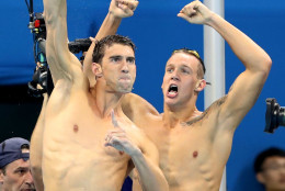 Caeleb Dressel and Michael Phelps, left, from the United States, celebrate winning the final of the men's 4x100-meter freestyle relay during the swimming competitions at the 2016 Summer Olympics, Sunday, Aug. 7, 2016, in Rio de Janeiro, Brazil. (AP Photo/Lee Jin-man)