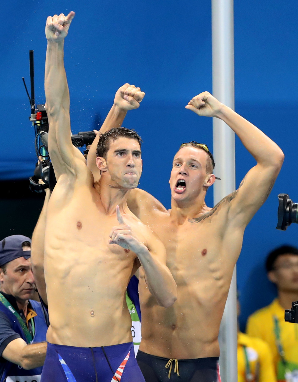 Caeleb Dressel and Michael Phelps, left, from the United States, celebrate winning the final of the men's 4x100-meter freestyle relay during the swimming competitions at the 2016 Summer Olympics, Sunday, Aug. 7, 2016, in Rio de Janeiro, Brazil. (AP Photo/Lee Jin-man)