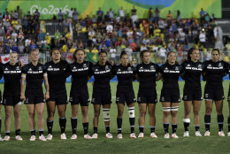 New Zealand's players line up for the singing of the national anthem during the women's rugby sevens gold medal match against Australia at the Summer Olympics in Rio de Janeiro, Brazil, Monday, Aug. 8, 2016. (AP Photo/Themba Hadebe)