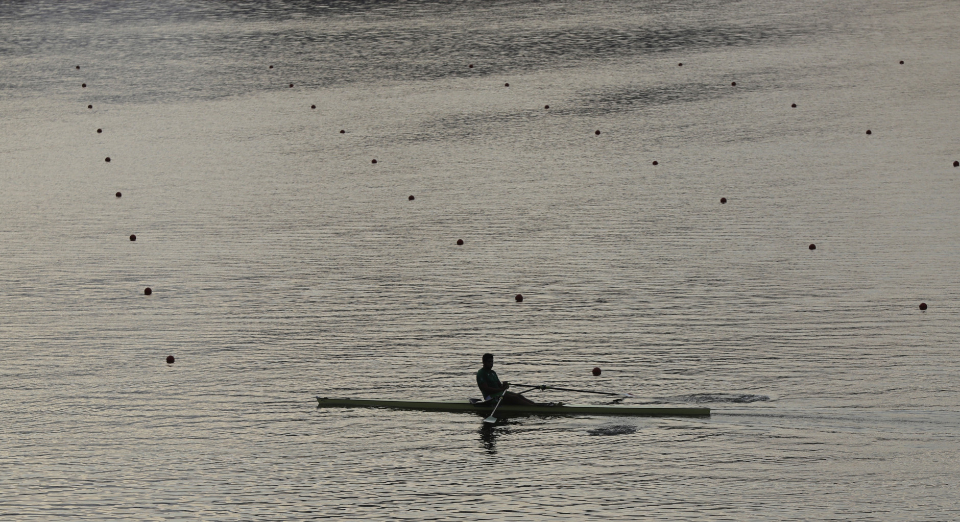 A rower practices prior to competition during the 2016 Summer Olympics in Rio de Janeiro, Brazil, Tuesday, Aug. 9, 2016. (AP Photo/Luca Bruno)