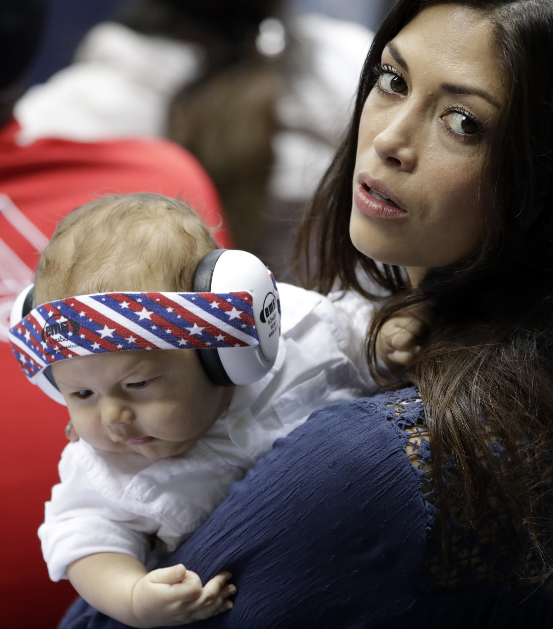 Nicole Johnson, fiance of United States' Michael Phelps, holds their baby Boomer during the swimming competitions at the 2016 Summer Olympics, Thursday, Aug. 11, 2016, in Rio de Janeiro, Brazil. (AP Photo/Natacha Pisarenko)