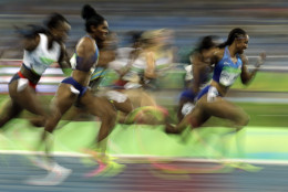 United States' Brianna Rollins, right, competes in the women's 100-meter hurdles final during the athletics competitions of the 2016 Summer Olympics at the Olympic stadium in Rio de Janeiro, Brazil, Wednesday, Aug. 17, 2016. (AP Photo/Charlie Riedel)