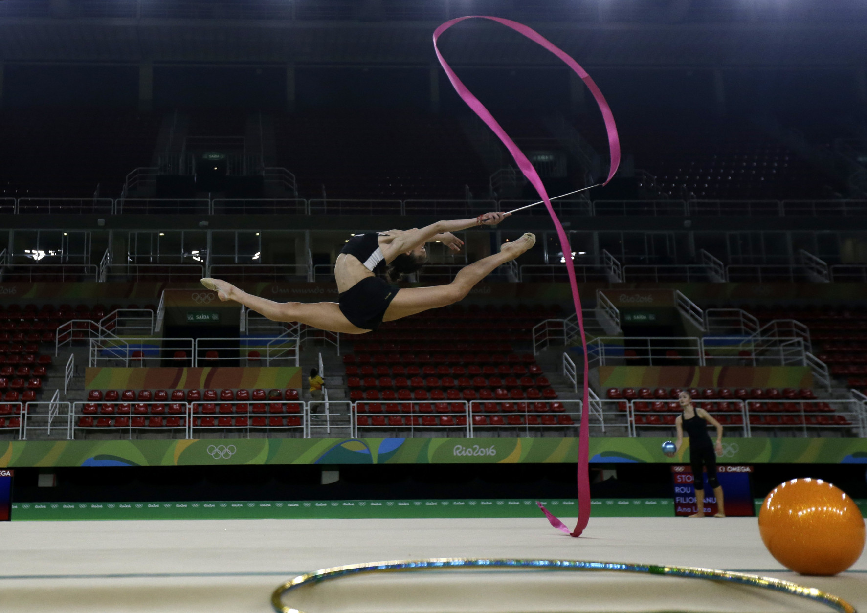 Bulgaria's Neviana Vladinova practices her routine a day ahead of the rhythmic gymnastics individual all-around qualifications at the 2016 Summer Olympics in Rio de Janeiro, Brazil, Thursday, Aug. 18, 2016. (AP Photo/Julio Cortez)