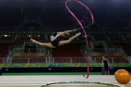 Bulgaria's Neviana Vladinova practices her routine a day ahead of the rhythmic gymnastics individual all-around qualifications at the 2016 Summer Olympics in Rio de Janeiro, Brazil, Thursday, Aug. 18, 2016. (AP Photo/Julio Cortez)