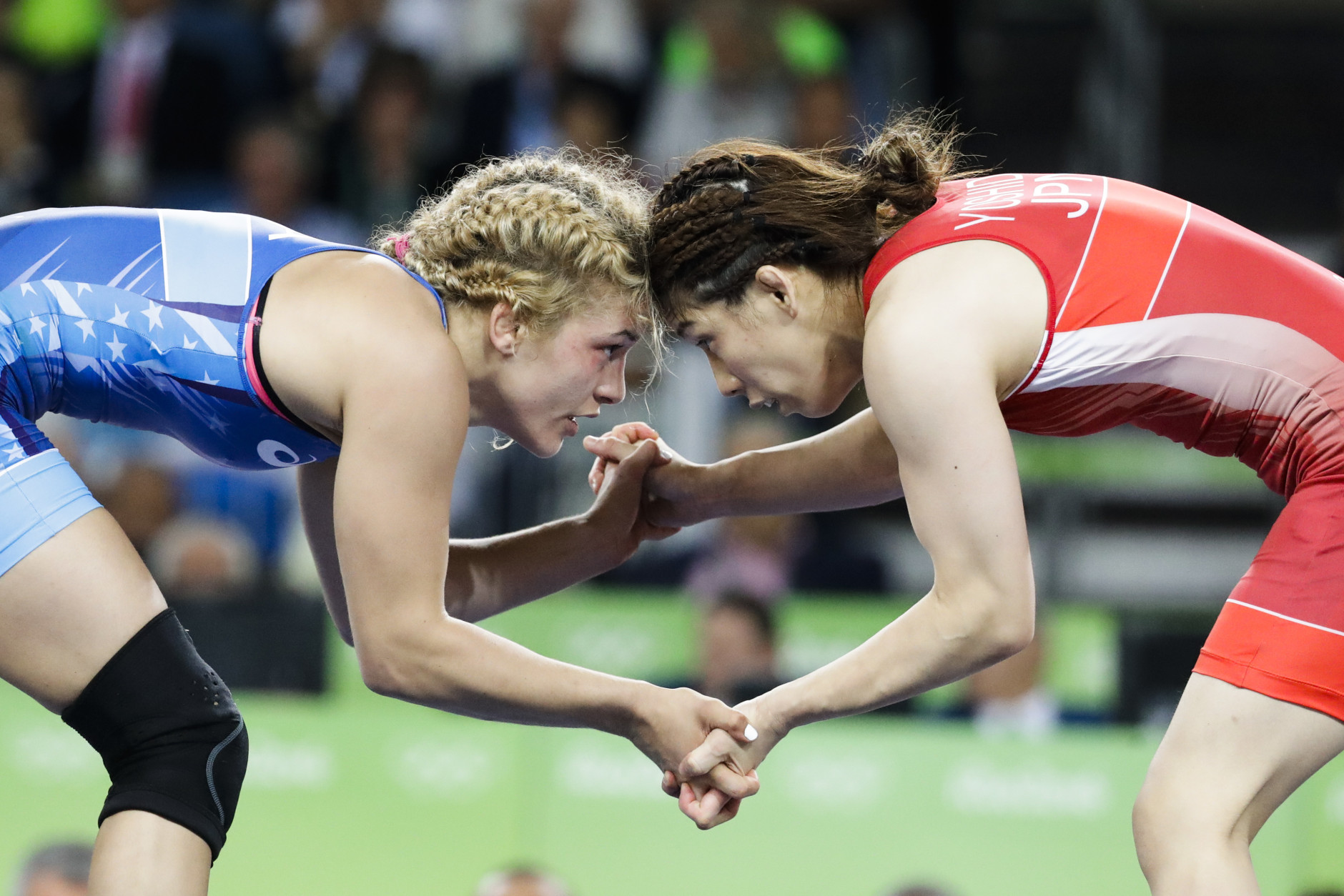 United States' Helen Louise Maroulis, blue, competes against Japan's Saori Yoshida for the gold medal of the women's 53-kg freestyle wrestling competition at the 2016 Summer Olympics in Rio de Janeiro, Brazil, Thursday, Aug. 18, 2016. (AP Photo/Markus Schreiber)