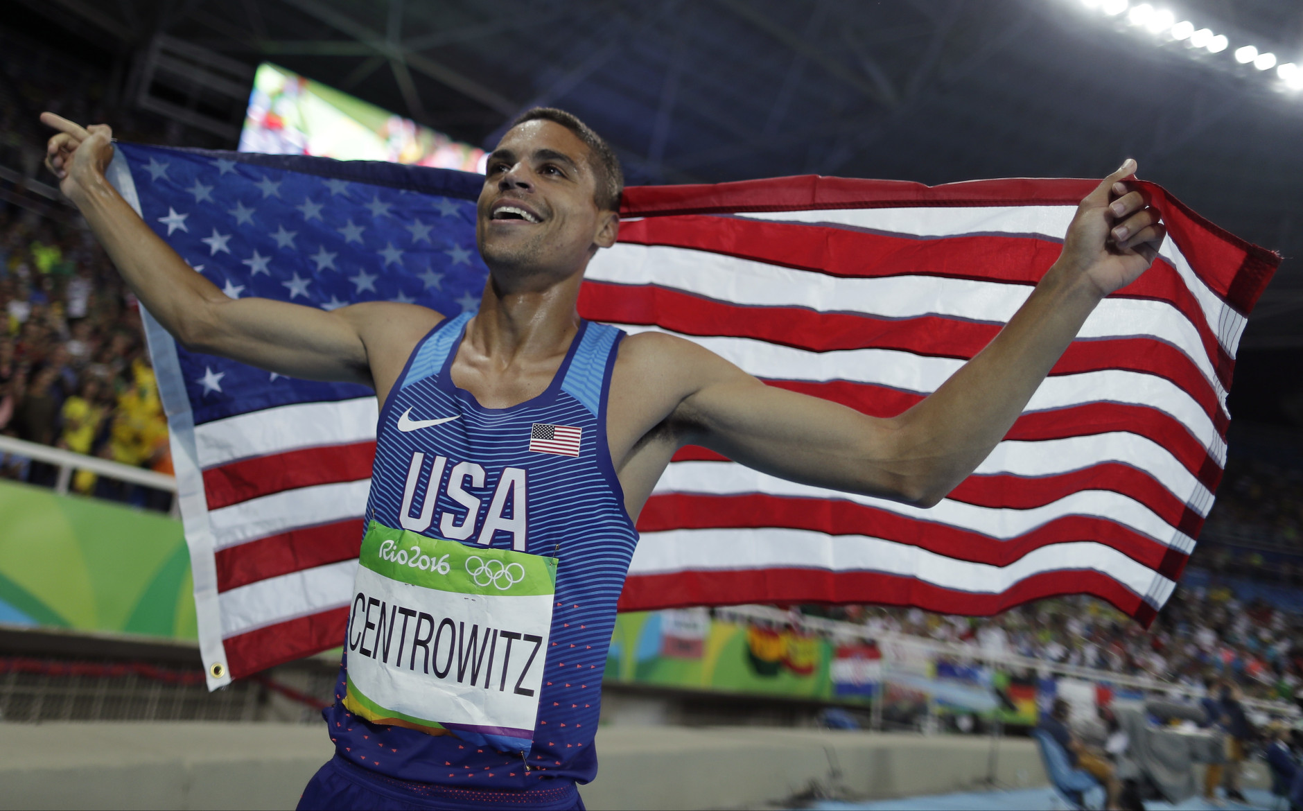 United States' Matthew Centrowitz celebrates after winning the gold medal in the men's 1500-meter final during the athletics competitions of the 2016 Summer Olympics at the Olympic stadium in Rio de Janeiro, Brazil, Saturday, Aug. 20, 2016. (AP Photo/Matt Slocum)
