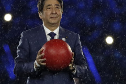 Japan's Prime Minister Shinzo Abe appears during the closing ceremony in the Maracana stadium at the 2016 Summer Olympics in Rio de Janeiro, Brazil, Sunday, Aug. 21, 2016. (AP Photo/Matt Dunham)
