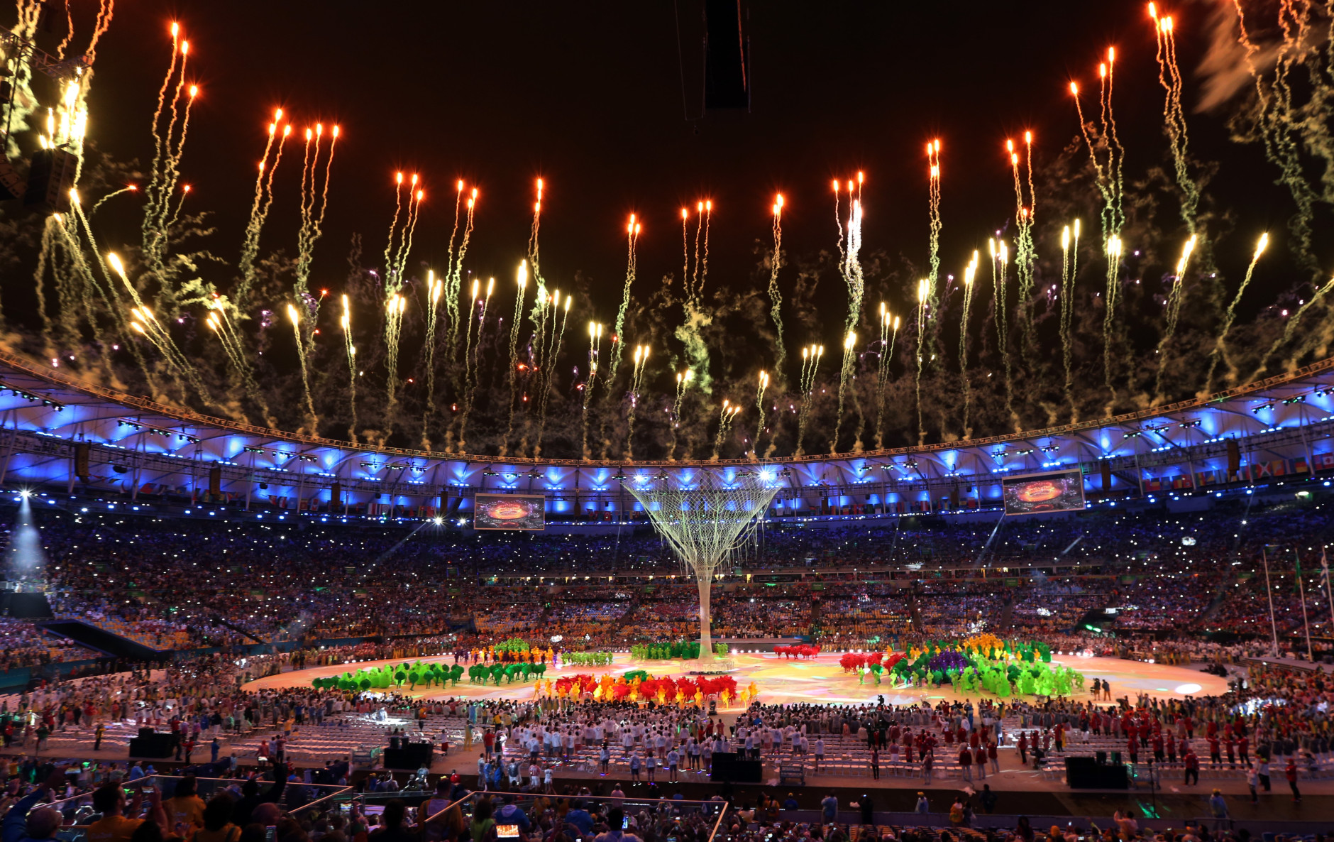 Fireworks goes off after the Olympic flame was extinguished during the closing ceremony in the Maracana stadium at the 2016 Summer Olympics in Rio de Janeiro, Brazil, Sunday, Aug. 21, 2016. (AP Photo/Natacha Pisarenko)