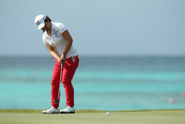 Sei Young Kim of South Korea sinks a putt on the last day of play at the Pure Silk Bahamas LPGA Classic at the Ocean Club Golf Course, Paradise Island, Bahamas, Sunday, Feb 8, 2015. Kim went on to win the tournament in a three-way playoff. (AP Photo/Tim Aylen)