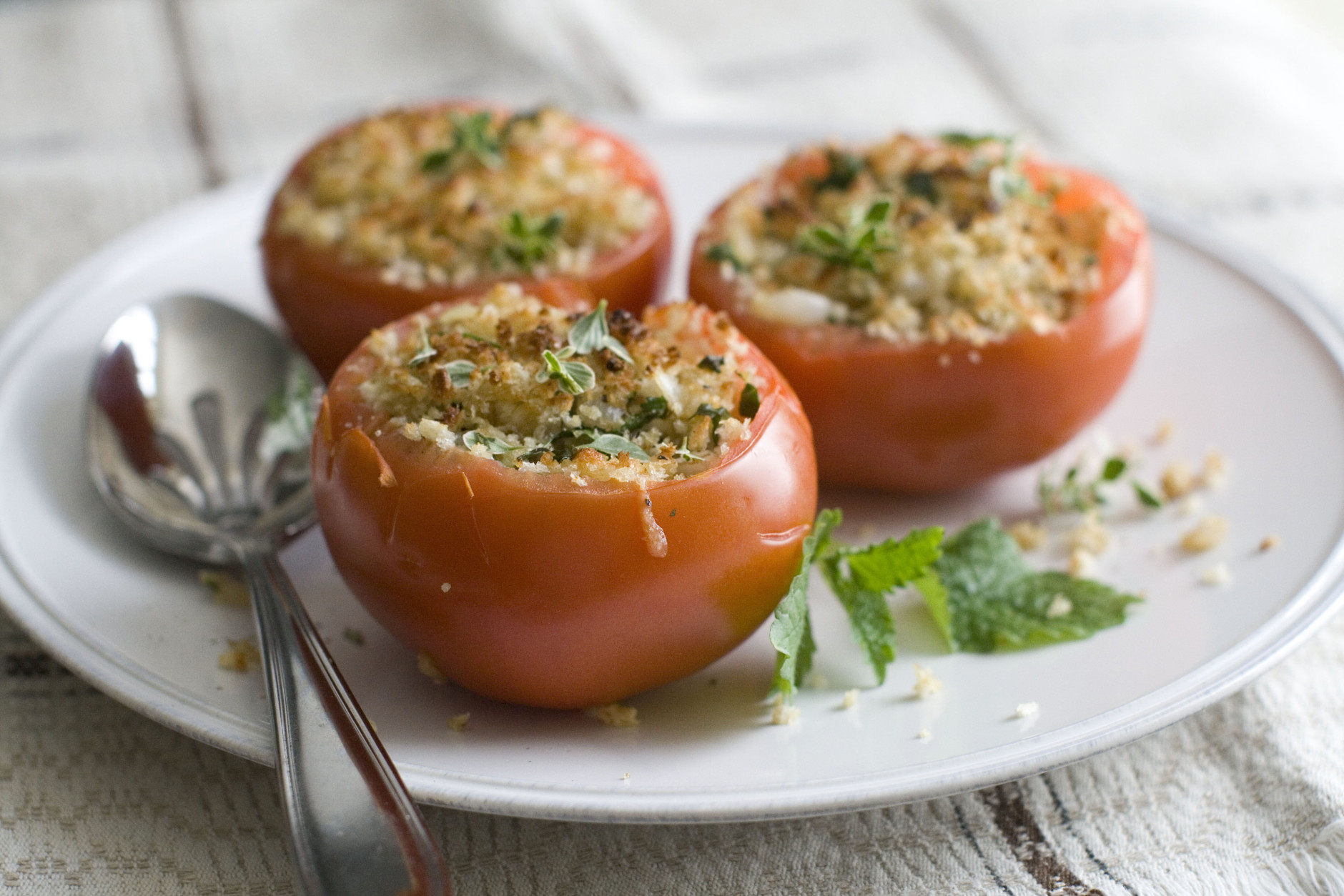 This June 30, 2014 photo shows cheese stuffed tomatoes in Concord, N.H. (AP Photo/Matthew Mead)