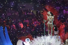 Plumed dancers appear as part of the closing ceremony in the Maracana stadium at the 2016 Summer Olympics in Rio de Janeiro, Brazil, Sunday, Aug. 21, 2016. (AP Photo/Mark Humphrey)