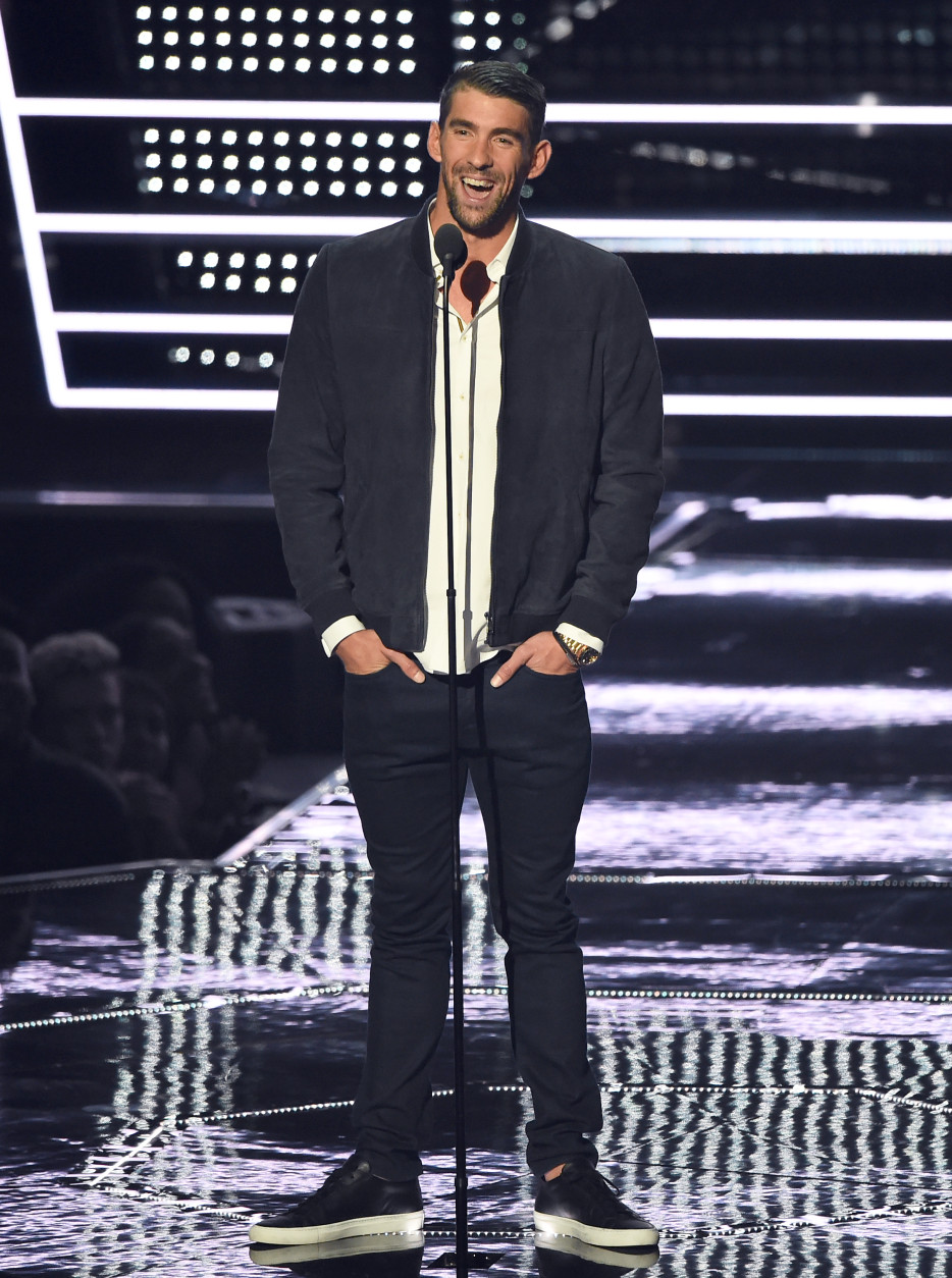 Michael Phelps introduces a performance by Future at the MTV Video Music Awards at Madison Square Garden on Sunday, Aug. 28, 2016, in New York. (Photo by Charles Sykes/Invision/AP)