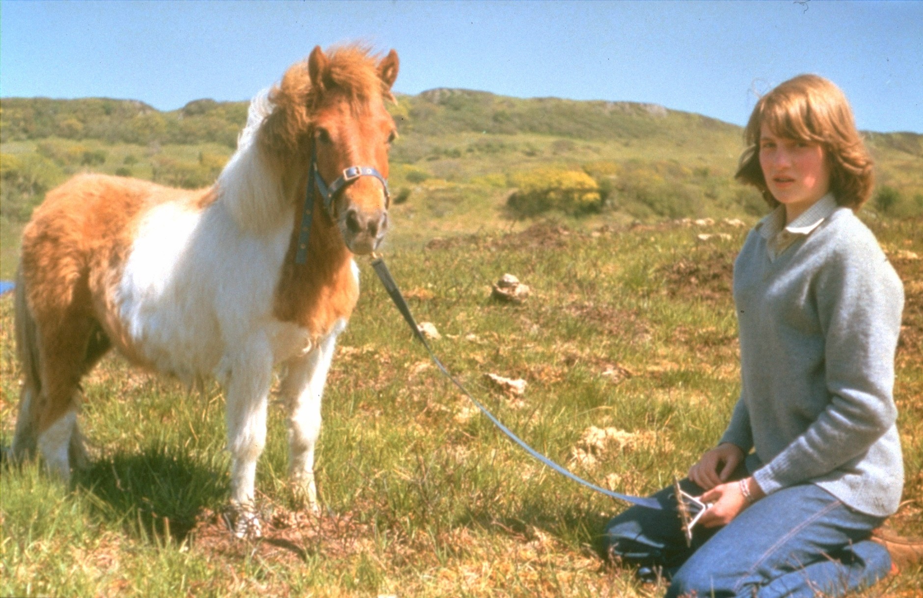 Family album picture of Lady Diana Spencer with Souffle, a Shetland pony, at her mother's home in Scotland during the summer of 1974.  (AP Photo/ho)