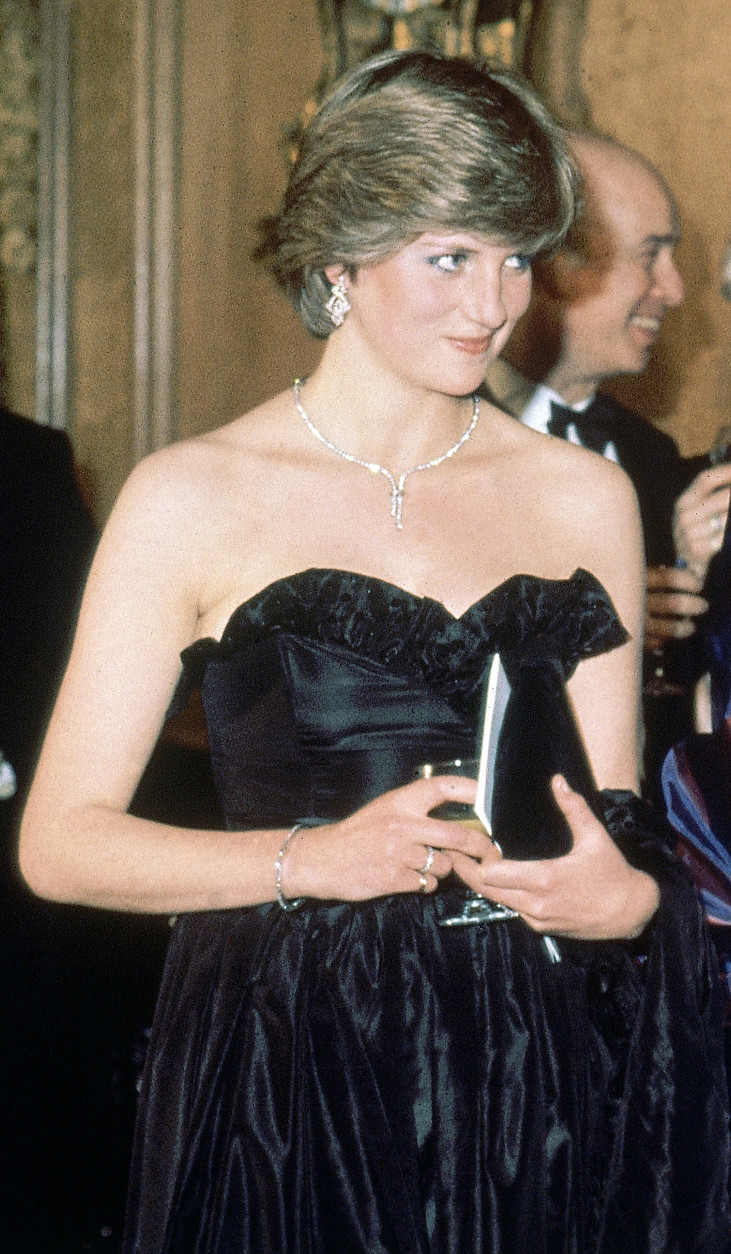 FILE - In this March 9, 1981 file photo, Lady Diana Spencer, then-fiancee of Britain's Prince Charles attends her first official engagement, a charity event at the Goldsmith's Hall, in London. The strapless silk taffeta dress worn by Lady Diana Spencer is expected to fetch between 30,000 pounds and 50,000 pounds ($36,000 to $61,000) at auction Tuesday, June 8, 2010. (AP Photo/Peter Skingley, pool, file)