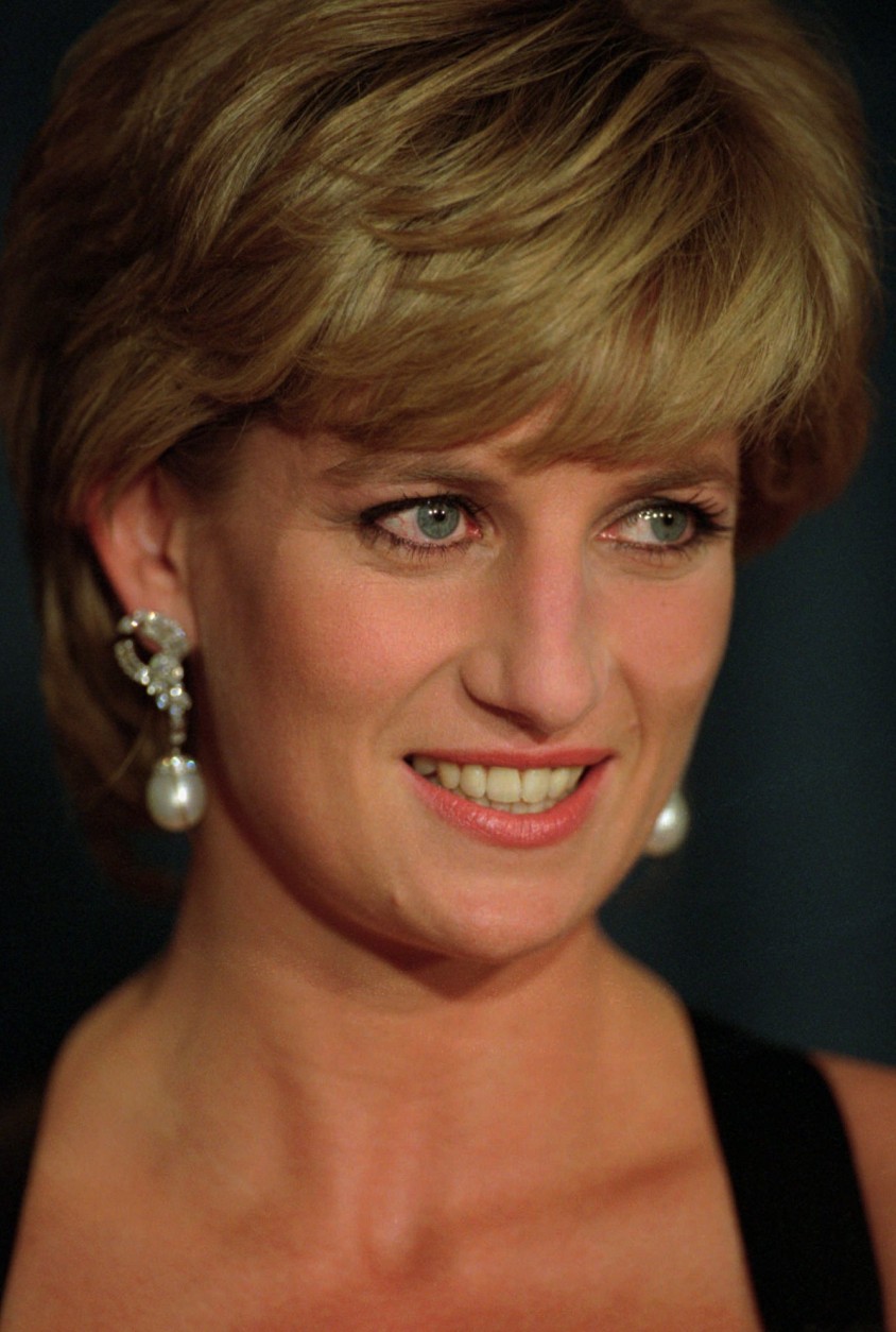 Princess Diana smiles at the United Cerebral Palsy's annual dinner at the New York Hilton on Monday evening, Dec. 11, 1995.  Diana is to be honored with United Cerebral Palsy's Humanitarian Award.   (AP Photo/ Mark Lennihan,pool)