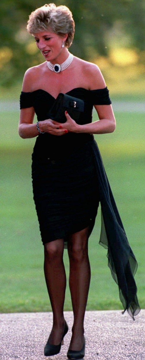 FILE - Diana, Princess of Wales wearing a black pleated chiffon dress, with floating side panel, by Christina Stamboulian, during a party given at the Serpentine Gallery in London in this 1996 file photo. Princess Diana died in a car crash in Paris early Sunday August 31, 1997, along with her friend Dodi Fayed and the driver of the car. (AP Photo/Files)