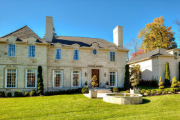 This photo provided by MRIS listing service shows 610 Braddock Road in Alexandria, Virginia. The French country-style house was built in 2012 and features seven bedrooms and nine bathrooms. The home sold for $3.765 million in July. (MRIS)