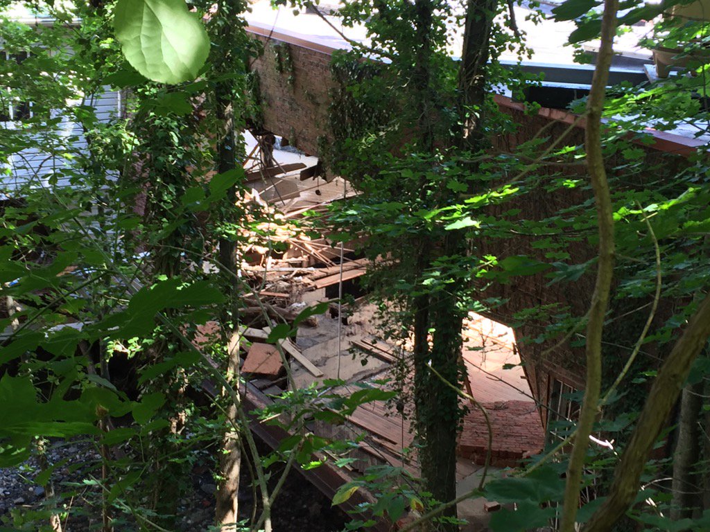 In Ellicott City, Caplan's Dept. Store building has an entire brick wall that collapsed from flooding, seen here on Aug. 4, 2016. (WTOP/John Aaron)