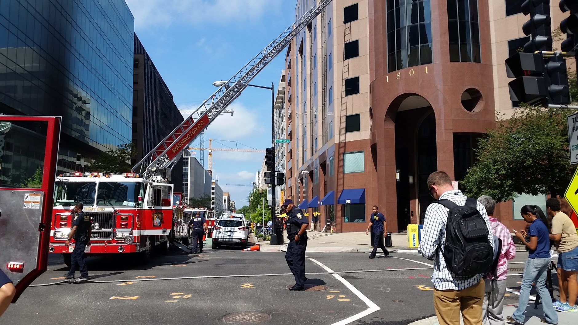 The building across the street, at 1801 L Street, was evacuated at about 10:45 a.m. (WTOP/Kathy Stewart)